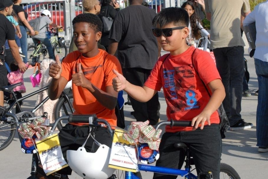 Jenson USA Supports East Hills Holiday Bicycle Giveaway to Sixty Students